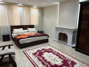 A bed or beds in a room at The best location in garden city