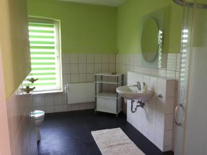 Koupelna v ubytování Ferienwohnung Wassermühlenholz Kappeln