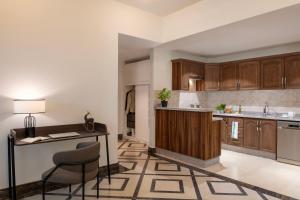 A cozinha ou kitchenette de Somerset Al Mansoura Doha