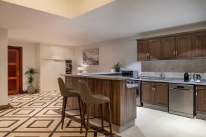 A cozinha ou kitchenette de Somerset Al Mansoura Doha