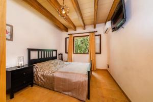 Ein Bett oder Betten in einem Zimmer der Unterkunft Can Company