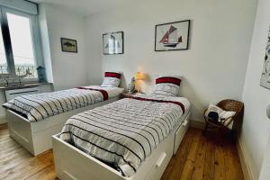 Posteľ alebo postele v izbe v ubytovaní Ti-maen - La maison de pierres