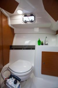 a bathroom with a toilet in a boat at Merry Fisher 795 - Iwona in Lucija