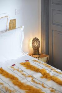 Postel nebo postele na pokoji v ubytování Riad Amya & Spa