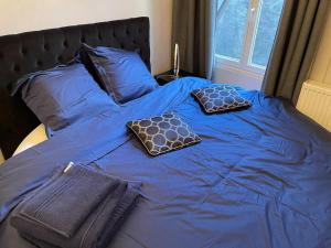 Postel nebo postele na pokoji v ubytování Le Fauriel - Fibre - Netflix/Disney+/Prime