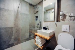 Ett badrum på Apartments Nives