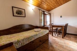 Postel nebo postele na pokoji v ubytování Antico Borghetto - Casa Vacanze