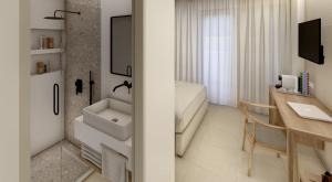 Kúpeľňa v ubytovaní AGRELLI Hotel & Suites