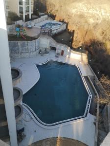 The swimming pool at or close to QUEEN'S VIEW app-9 free pool,parking, fitness & sea view