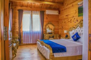 Postel nebo postele na pokoji v ubytování Tea Resort