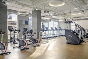 a gym with treadmills and exercise bikes at Downtown 1BR w Gym Roof WD nr Pike Pl Mkt SEA-239 in Seattle