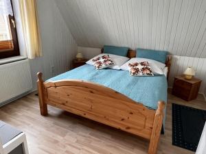 Een bed of bedden in een kamer bij Schneider, Siegrid, FW 2