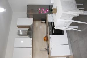 Kuchyň nebo kuchyňský kout v ubytování Apartment Orebic 4526b
