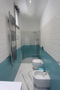 Koupelna v ubytování Hotel Presidente
