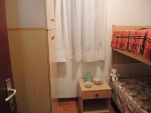 Katil dua tingkat atau katil-katil dua tingkat dalam bilik di Villa Katiò