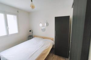 Postel nebo postele na pokoji v ubytování Charmant studio à Toulouse - Gare & Métro Matabiau