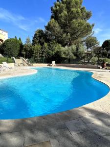 The swimming pool at or close to Villa - 6pers - Piscine - Terrasses - Golf à 5min