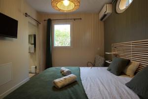 Posteľ alebo postele v izbe v ubytovaní Villa - 6pers - Piscine - Terrasses - Golf à 5min