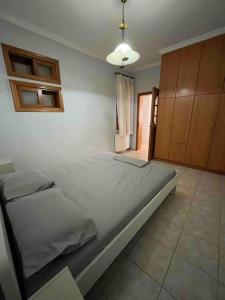 Postel nebo postele na pokoji v ubytování Lixouri Center Apartment
