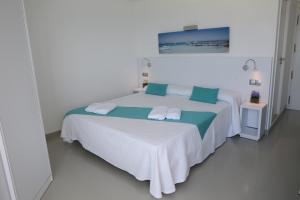 Posteľ alebo postele v izbe v ubytovaní Hotel Maysi + 37 fotografií