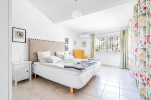Posteľ alebo postele v izbe v ubytovaní Townhouse close to the beach