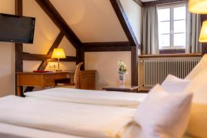 Posteľ alebo postele v izbe v ubytovaní Vergeiner's Hotel Traube