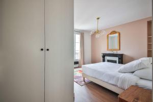 Posteľ alebo postele v izbe v ubytovaní 3G#Appart 6Pers#2 Chambres#Commerce#Paris 15#AC