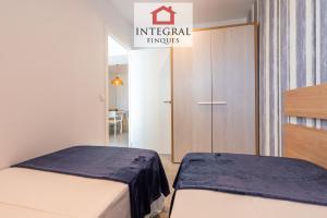 Posteľ alebo postele v izbe v ubytovaní Les Terrasses Apartament Palamós