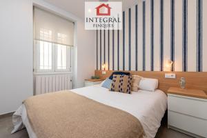 Posteľ alebo postele v izbe v ubytovaní Les Terrasses Apartament Palamós