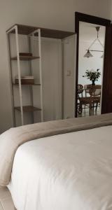 A bed or beds in a room at Los Castellanos nº 8 Suances