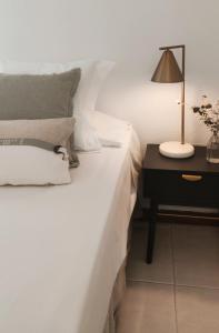 A bed or beds in a room at Los Castellanos nº 8 Suances