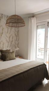 A bed or beds in a room at Los Castellanos nº 8 Suances