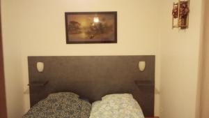 Posteľ alebo postele v izbe v ubytovaní VUE EXCEPTIONNELLE SUR LE LAC