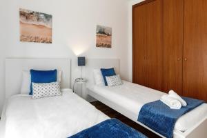 Кровать или кровати в номере Solange' Place