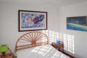 A bed or beds in a room at Club Villamar - Bordeus