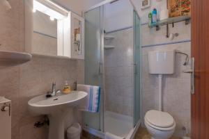 Koupelna v ubytování Apartments Crevatin + 11 fotografií