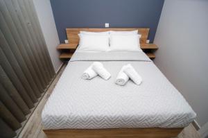 A bed or beds in a room at Studio vasiliki