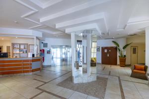 a lobby of a hospital with a reception desk at Residence De Vacance, superb 3 room apartment with in Saint-Laurent-du-Var