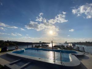 a swimming pool on the deck of a cruise ship at Nile cruise Aswan To Loxur 3 Nigh in Aswan +15 photos