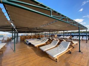 a deck of a boat with lounge chairs on it at Nile cruise Aswan To Loxur 3 Nigh in Aswan