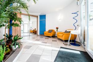 Area soggiorno di Hotel Squash Dependance