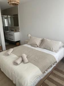 Posteľ alebo postele v izbe v ubytovaní Duplex place des lices