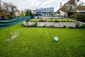 Giardino di Hotel Squash Dependance