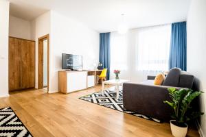TV o dispositivi per l'intrattenimento presso Hotel Squash Dependance