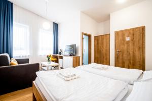 Letto o letti in una camera di Hotel Squash Dependance
