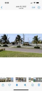 a screenshot of a street with palm trees at Starr & Adams Caribbean Oasis in Point