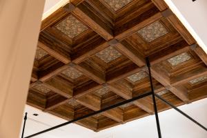 an image of a wooden ceiling in a building at Hotel Casa Palacio Don Ramón in Seville