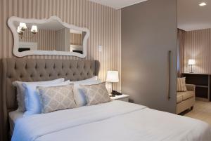 Cama ou camas em um quarto em Bella Gramado Resort & Spa by Gramado Parks