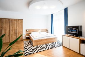 Letto o letti in una camera di Hotel Squash Dependance