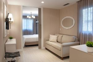 Cama ou camas em um quarto em Bella Gramado Resort & Spa by Gramado Parks